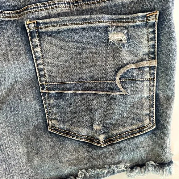 AMERICAN EAGLE DISTRESSED EXPOSED PINK POCKET SHORTIE JEAN SHORTS SIZE 14 - Picture 6 of 10